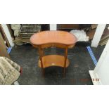 An inlaid kidney shaped side table