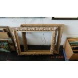 Two ornate carved frames