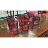 A set of six ruby etched glasses