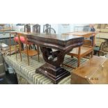 A 19th century mahogany fold over tea table