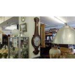 A large mahogany barometer,