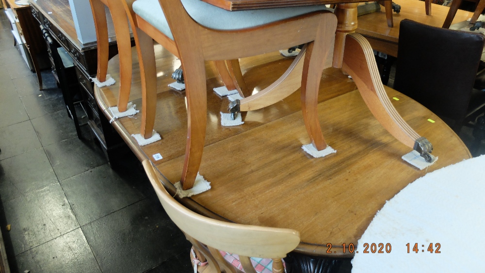 A mahogany extending dining table with extra leaf - Image 2 of 2