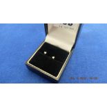 A pair of diamond earrings, white gold,