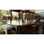 A regency style table (with extra leaf) and six chairs