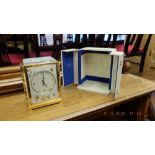 A Jaeger Le Coultre, Marina pattern, Atmos clock decorated with angel and fish, on white ground,