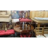 A 19th century breakfast table and four chairs