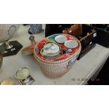 An oriental tea set in basket