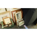 A quantity of framed prints etc.