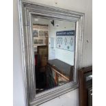 Silver framed bevelled mirror