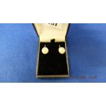 A new boxed 9ct gold large south sea pearl earrings