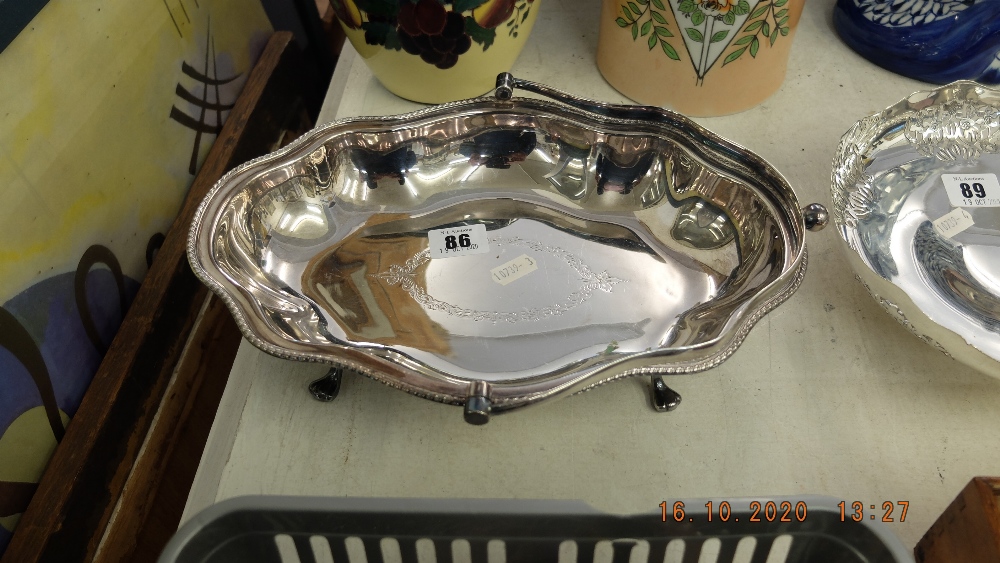 A silver plated entree dish