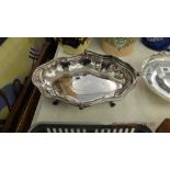 A silver plated entree dish