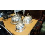 Three silver plated cloches