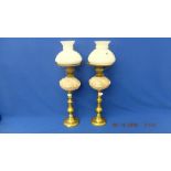 A pair of Victorian Peg oil lamps with shades