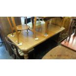 A late 19th century mahogany dining table,