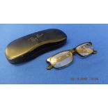 A pair of original tortoiseshell reading glasses in original case