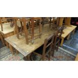 An oak table and six chairs