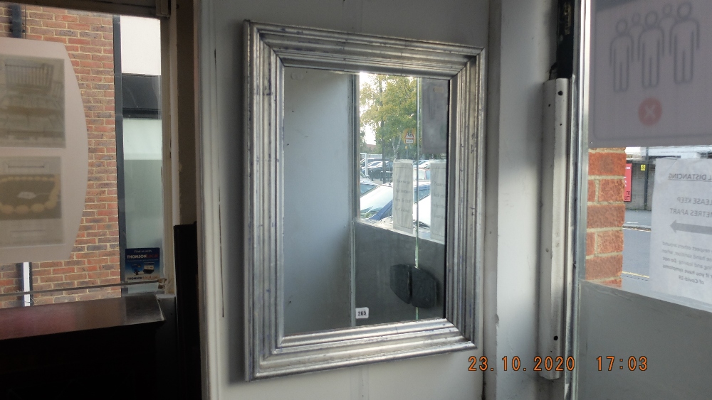 Silver framed bevelled mirror