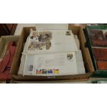 A collection of stamps and first day covers