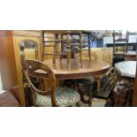 A 19th century mahogany table and four chairs