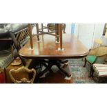 A 19th century mahogany breakfast table