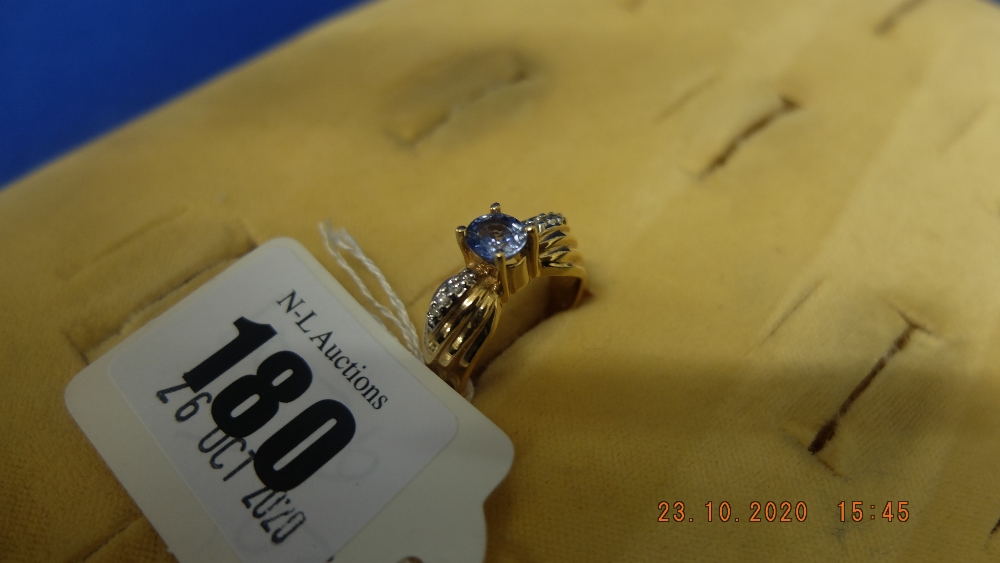 A 14ct gold sapphire and diamond ring