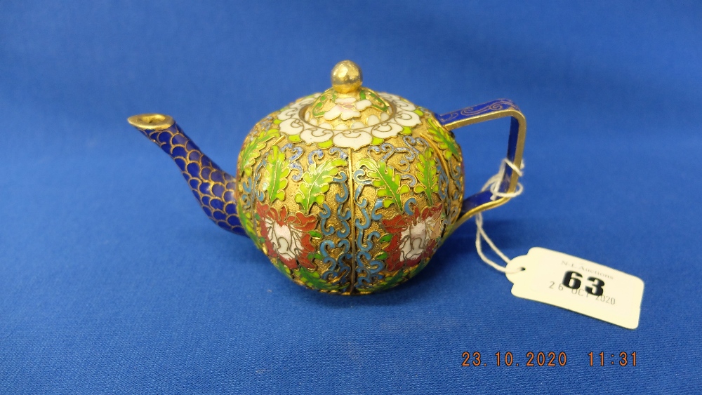 A small cloisonne teapot