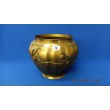 An oriental brass jardiniere