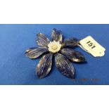 A large Lapis Lazuli and diamond brooch on 18ct gold base,