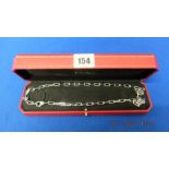 An 18ct white gold Cartier chain, 22 inches long,