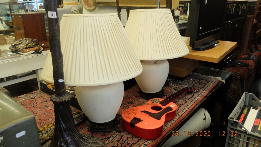 A pair of decorative lamps