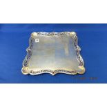 A hm silver decorative tray, 32 cms by 32 cms,