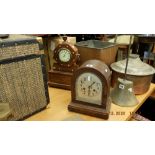 An antique oak case beehive clock plus one other