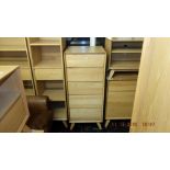 A John Lewis oak chest of five drawers