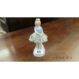A small figure of a girl,