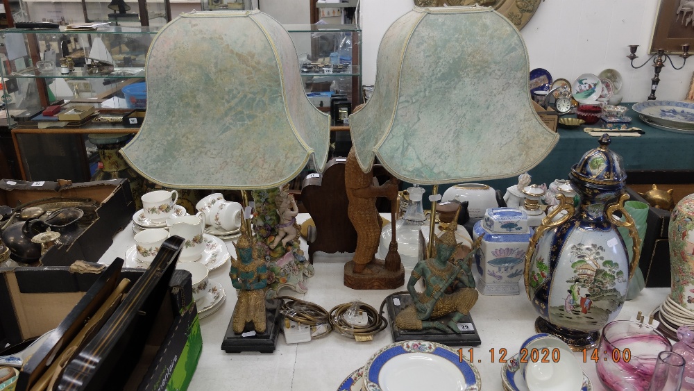 Two decorative Hindu figural lamps