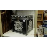A black and white painted box