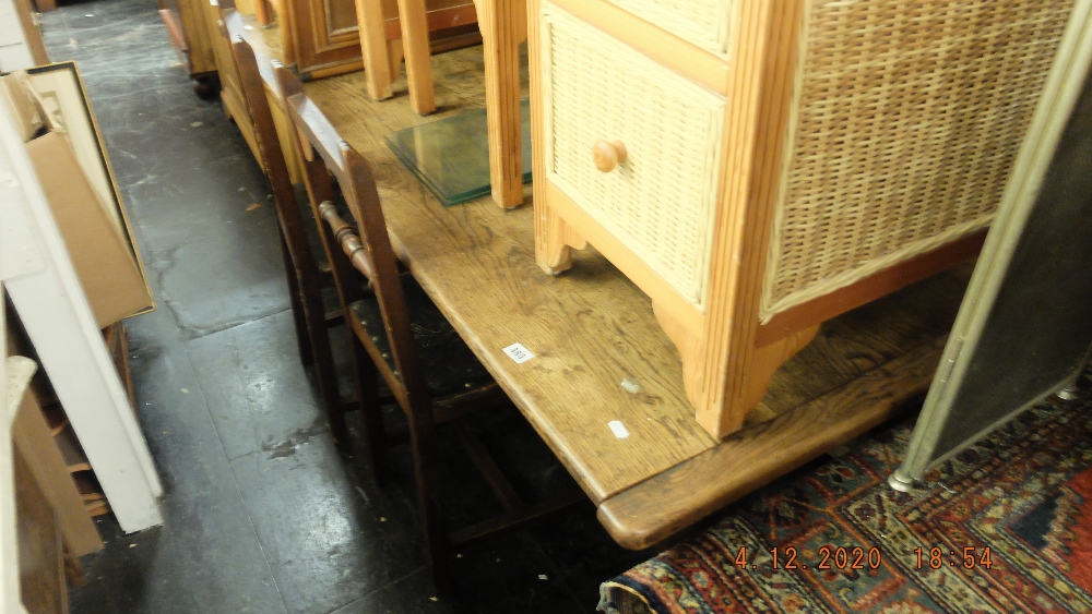 An oak table and six chairs