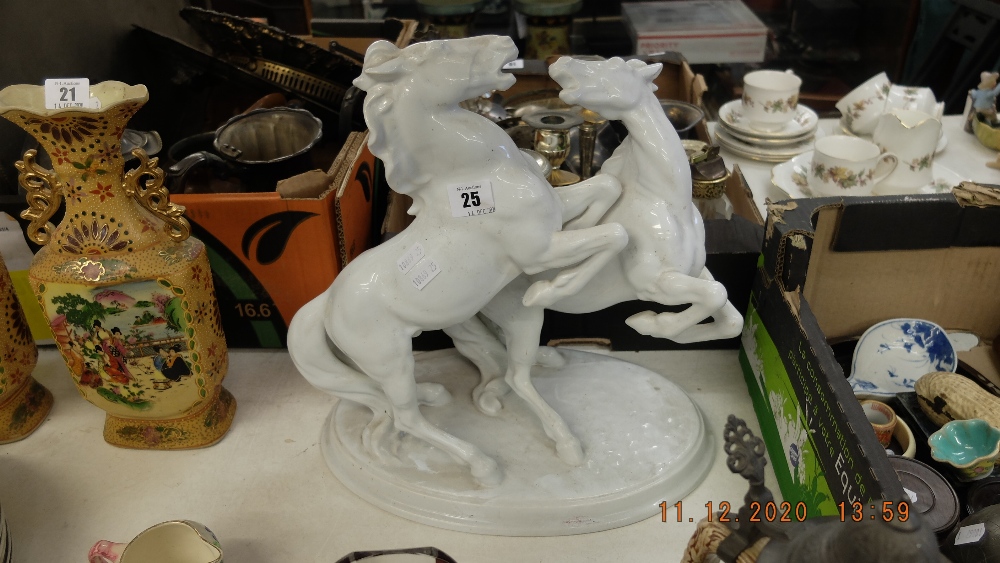A figure of two horses