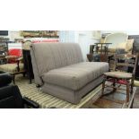 An upholstered sofa bed