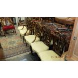 A set of twelve shield back dining chairs