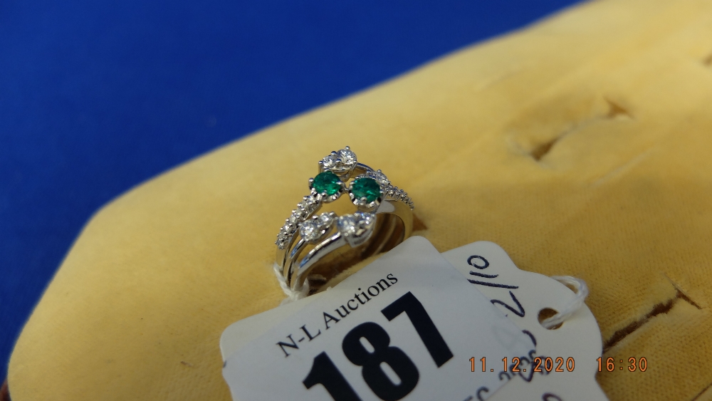 18ct white gold diamond and emerald cluster ring,