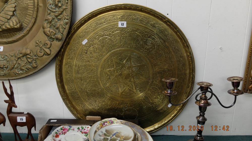 A large eastern brass tray