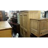 A 19th century pine double wardrobe.