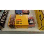 A Kodak boxed Instamatic camera,