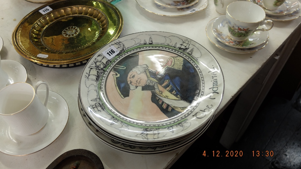 Eight Royal Doulton character plates