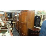 A Edwardian mahogany bow front wardrobe