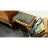 A mahogany piano stool