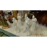 Five Royal Worcester figures, tender moments; First kiss, first teddy, first love,