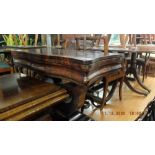 A 19th century mahogany fold over tea table